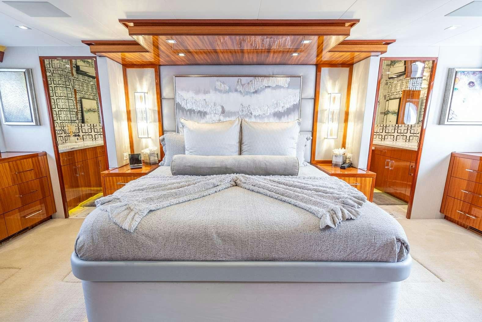 a bed in a room aboard DONE DEAL Yacht for Charter