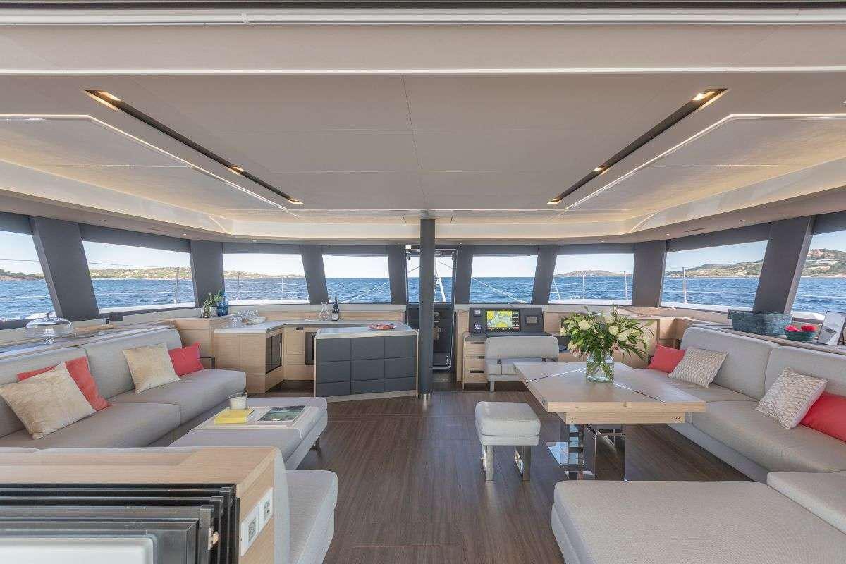 a living room with a large window aboard STEPHANIE Yacht for Charter