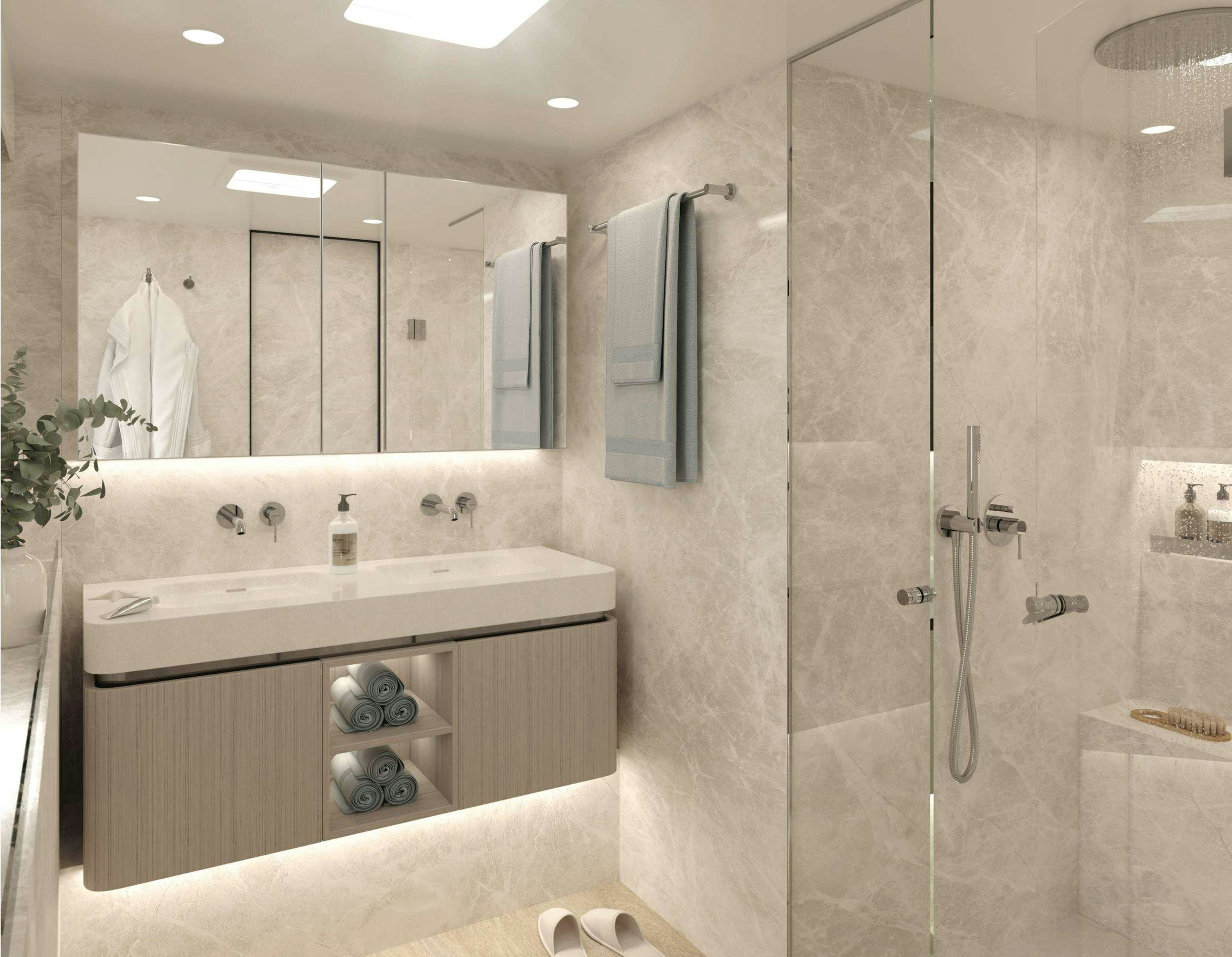 a bathroom with a glass shower aboard ENTRE4 Yacht for Charter