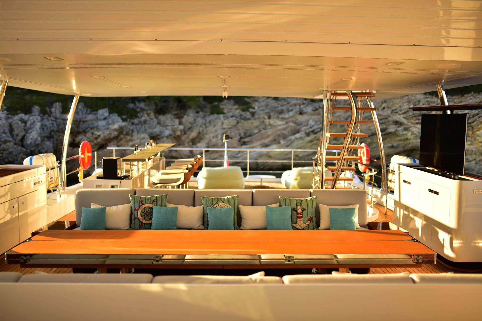 a room with a couch and a ladder aboard 116 YACHT Yacht for Charter