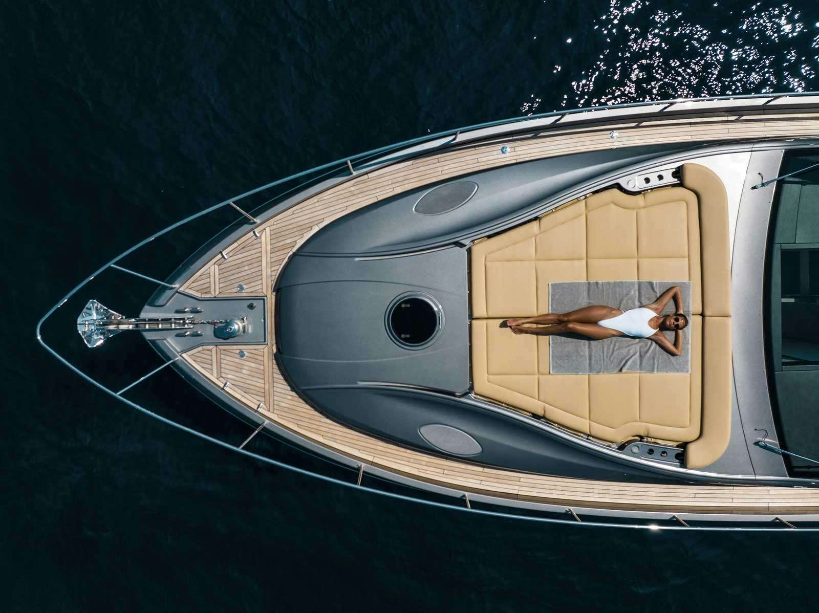 a person in a suit on a train aboard VELES Yacht for Charter