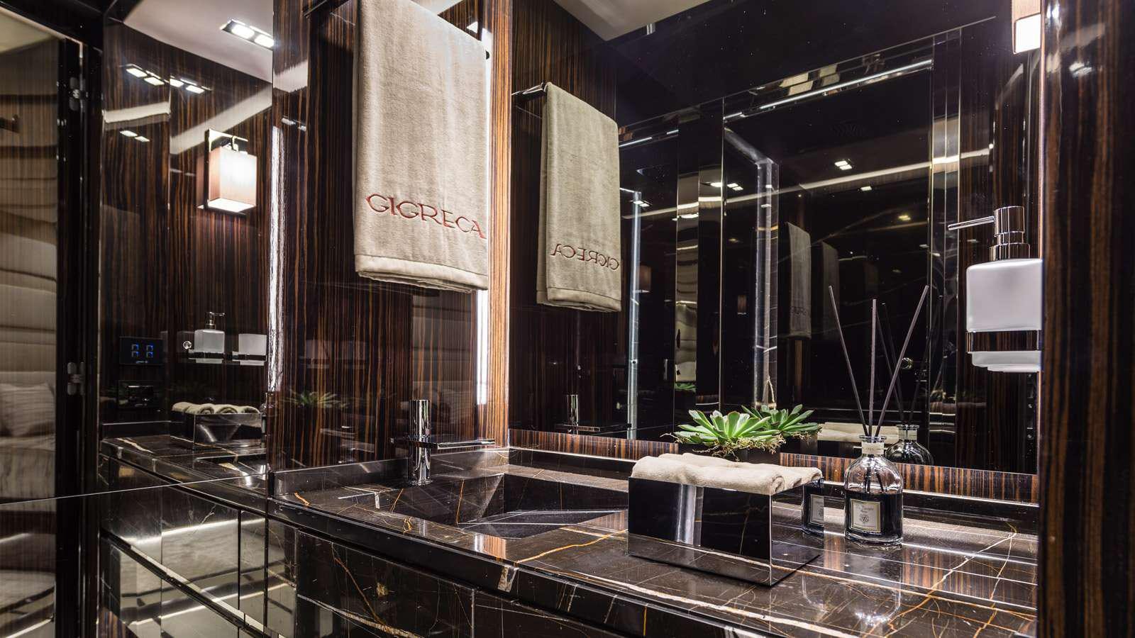 a large bathroom with a large counter aboard GIGRECA Yacht for Charter