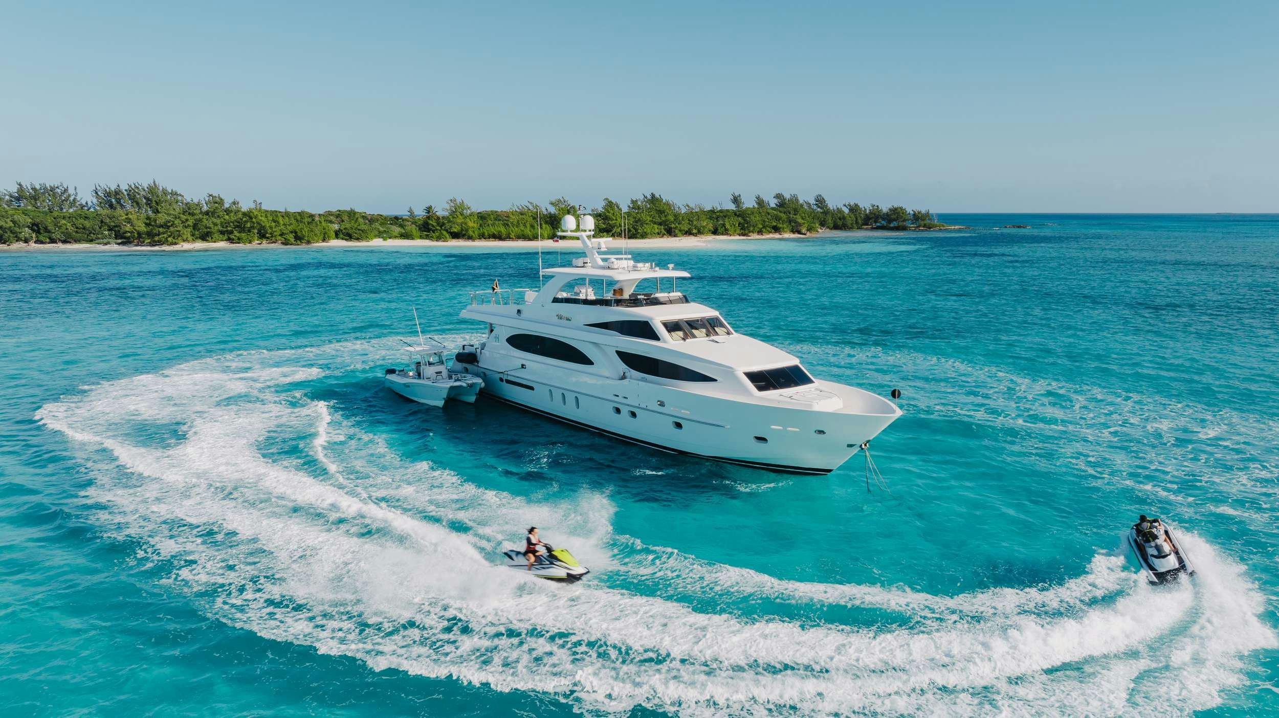 a boat and a person on the water aboard VITESSE Yacht for Charter