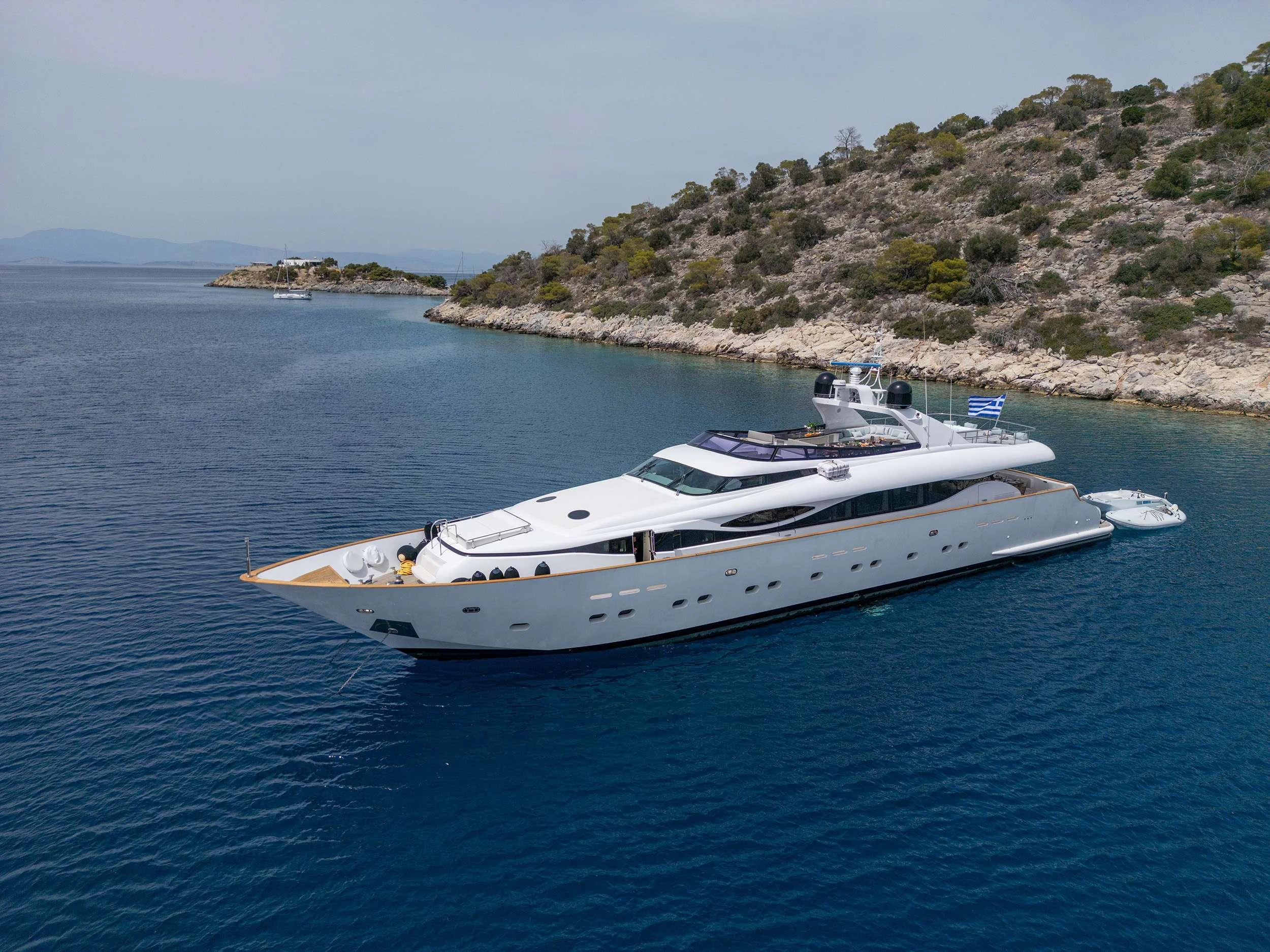 a white yacht in the water aboard PAREAKI II Yacht for Charter
