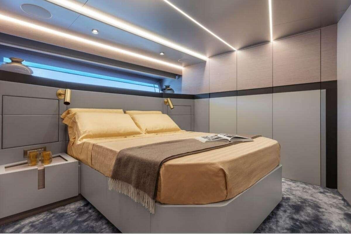 a bed in a room aboard 86 YACHT Yacht for Charter