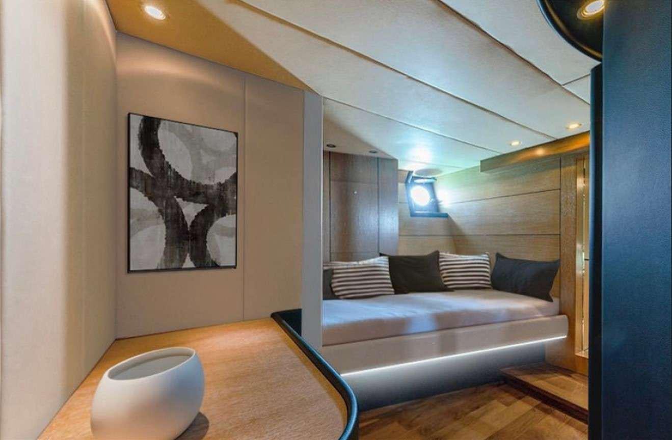 a bed in a room aboard GEMAYA Yacht for Charter