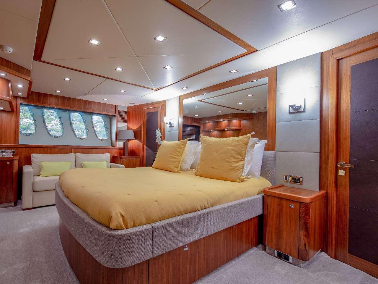 a hotel room with a bed aboard MR SEA Yacht for Charter