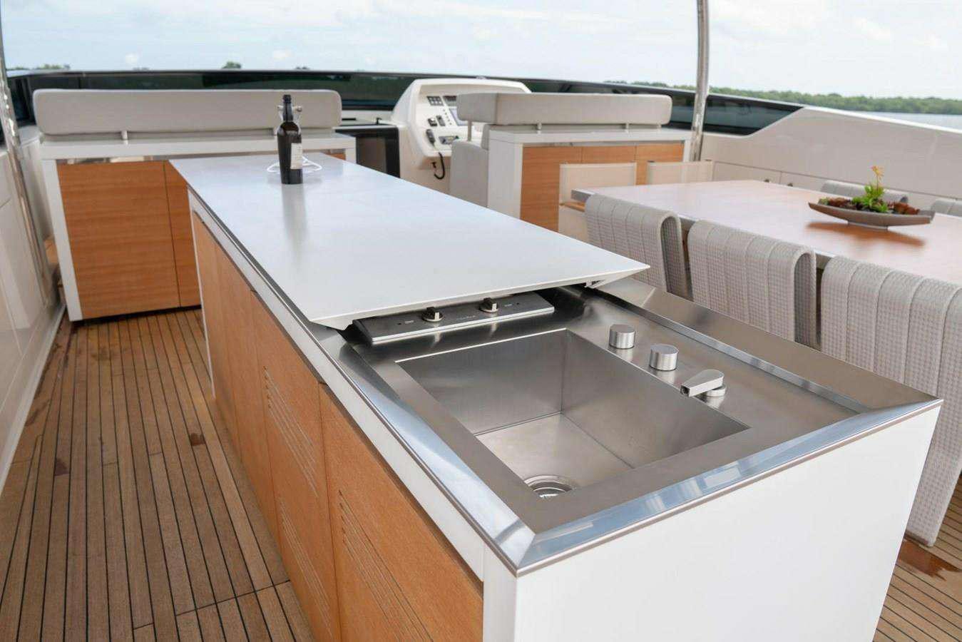 a kitchen with a large island aboard GOLDEN YACHT Yacht for Charter