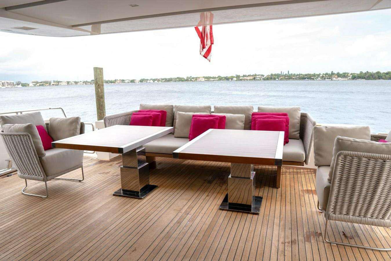 a table and chairs on a deck aboard GOLDEN YACHT Yacht for Charter