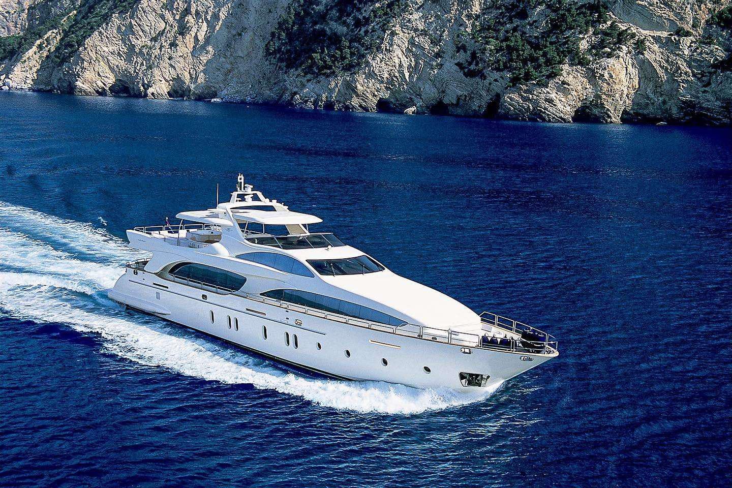 a white yacht on the water aboard RYLAX Yacht for Charter