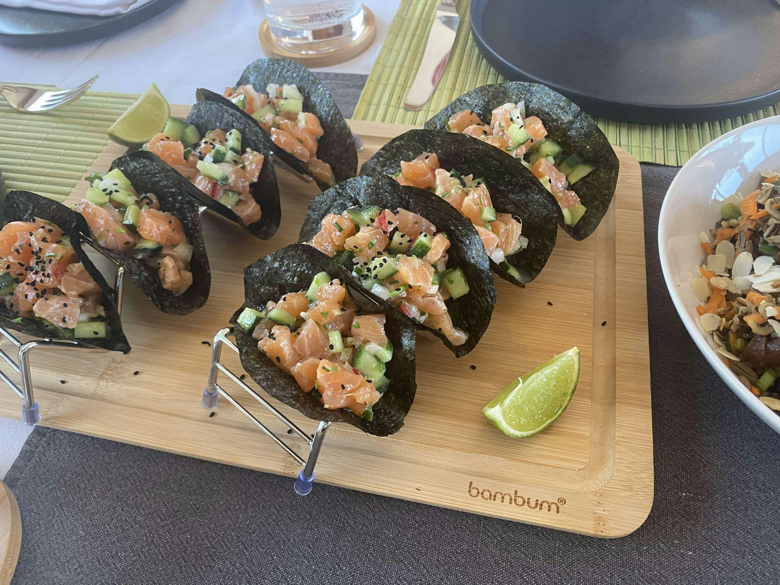 a plate of seafood on a table aboard JURA II Yacht for Charter