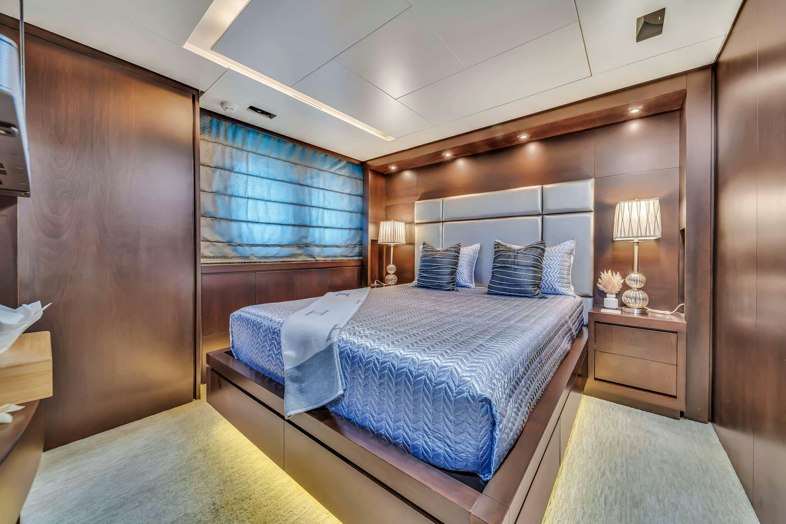 a bed in a room aboard RYLAX Yacht for Charter