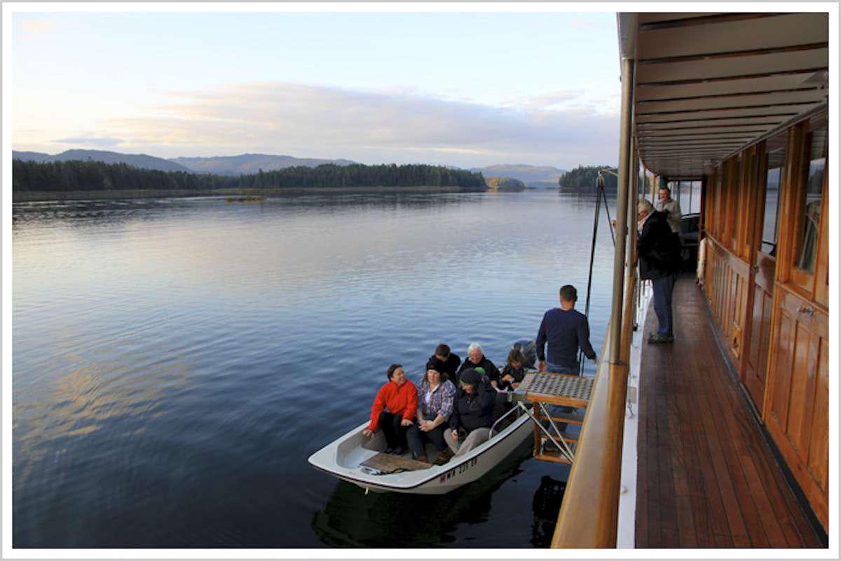 a group of people on a boat aboard DISCOVERY Yacht for Charter