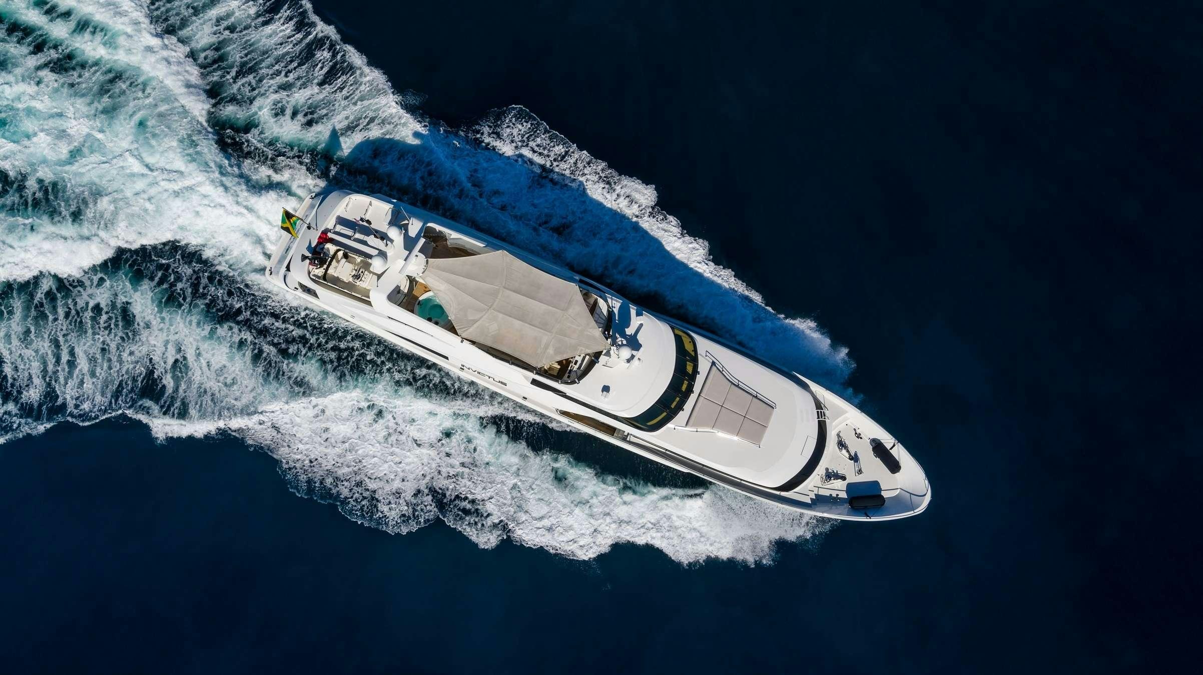 a boat on the water aboard INVICTUS Yacht for Charter