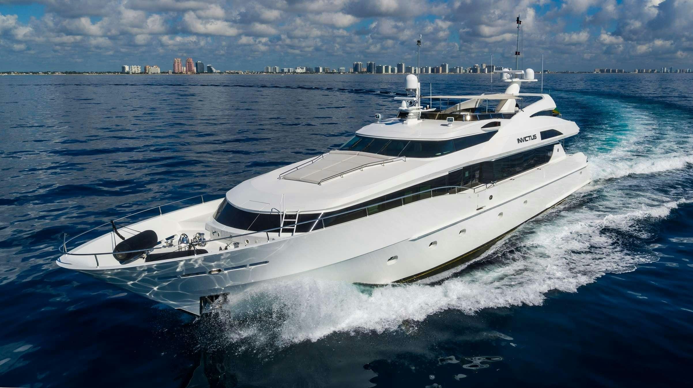 a white yacht on the water aboard INVICTUS Yacht for Charter