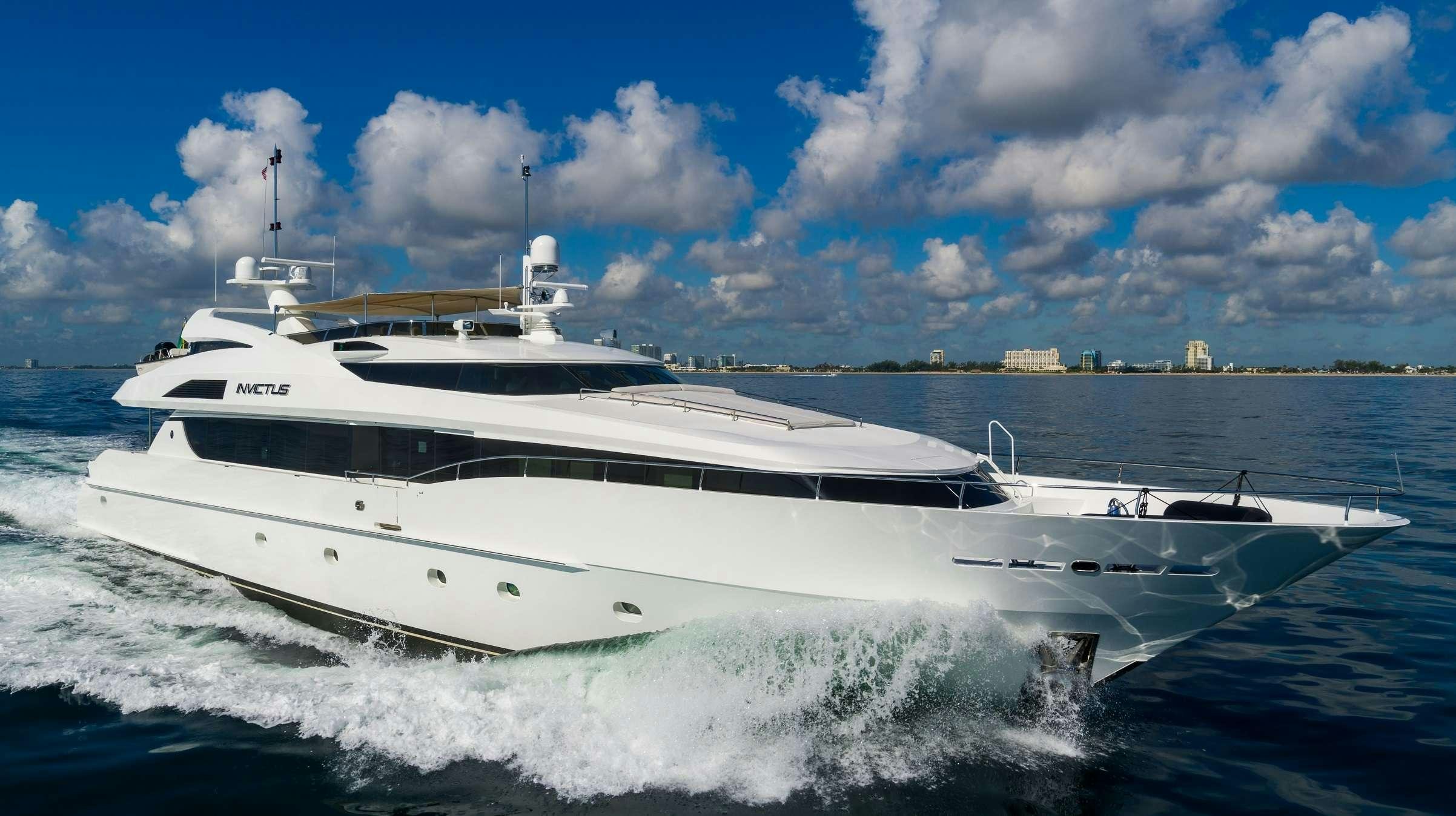 a white yacht on the water aboard INVICTUS Yacht for Charter