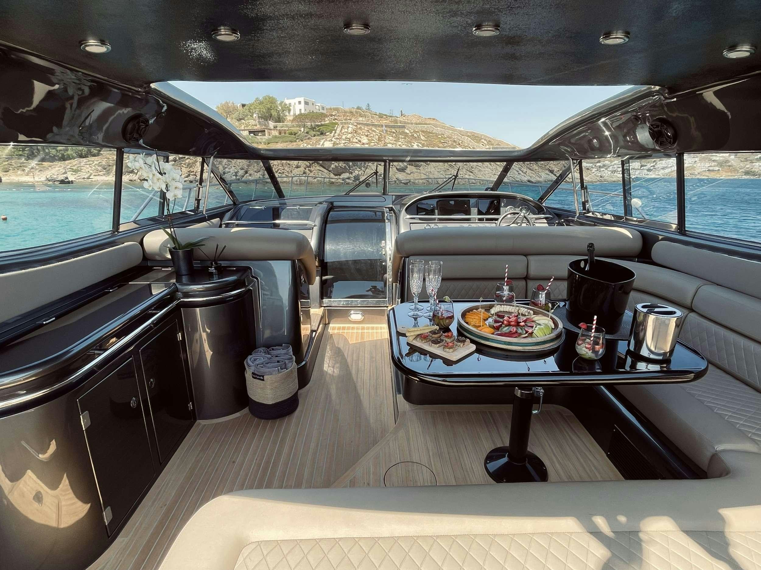 a boat with food and drinks on a boat aboard 007 Yacht for Charter