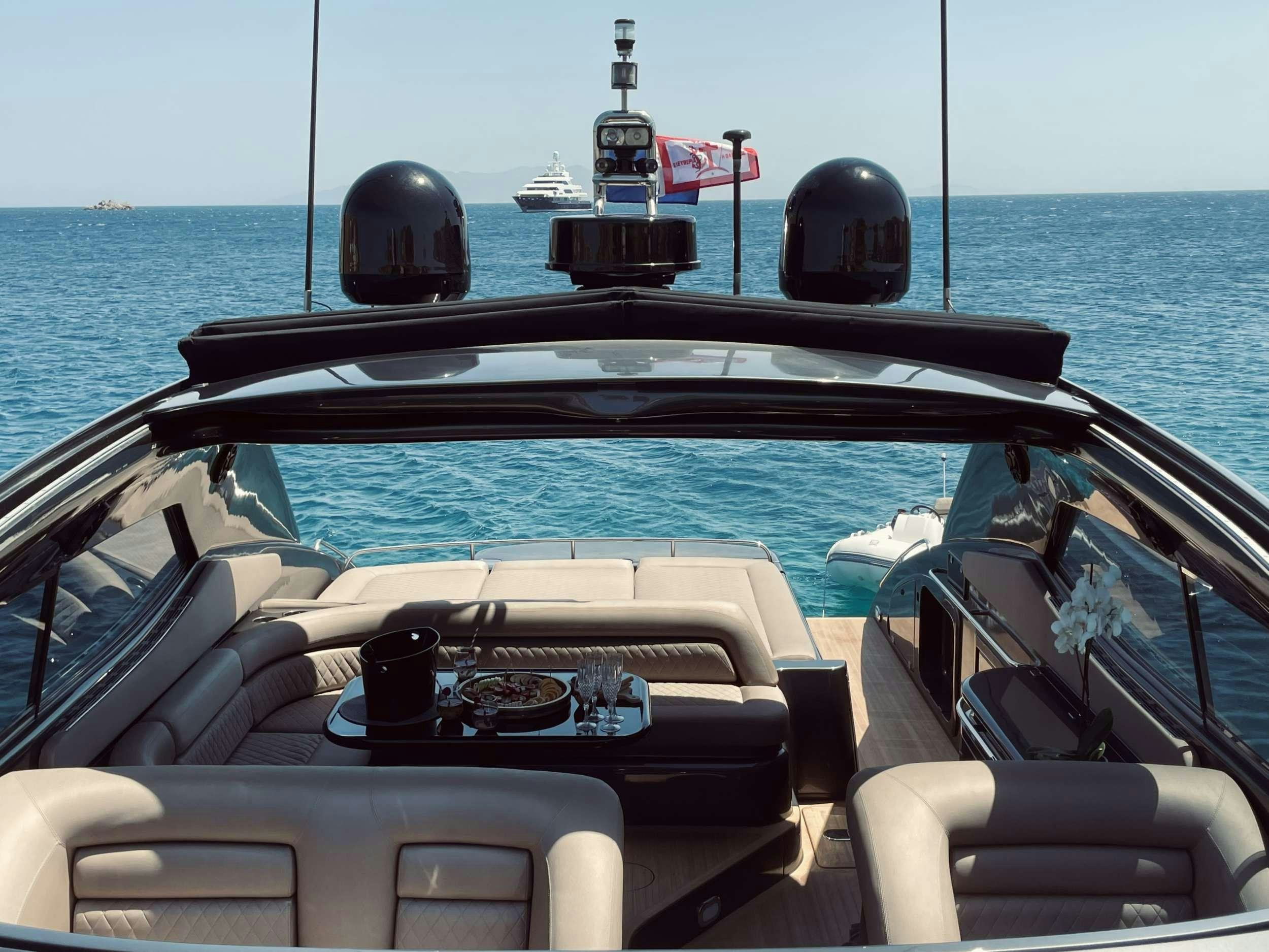 a boat with a paddle on the front aboard 007 Yacht for Charter