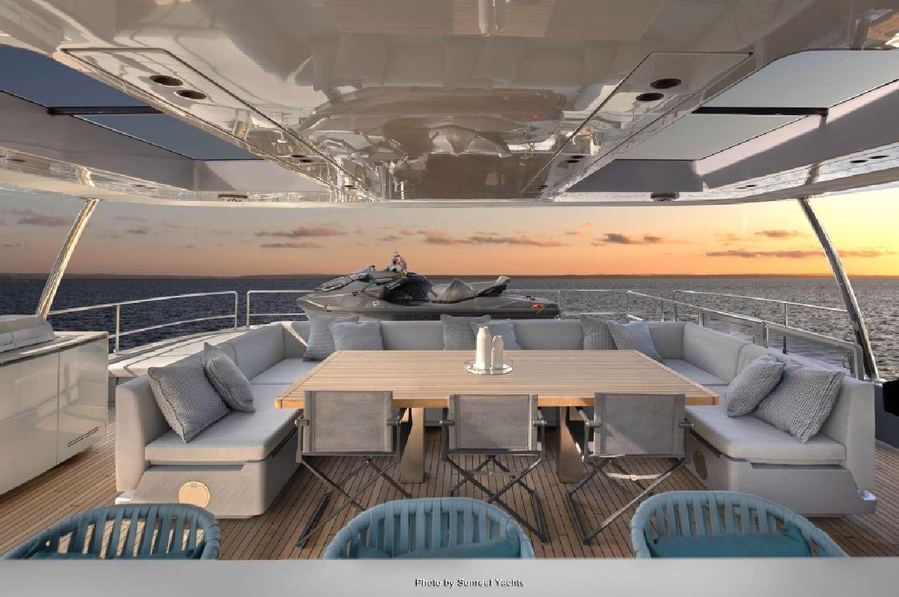 a lounge area with a couch and a pool table aboard SHADES OF GREY Yacht for Charter