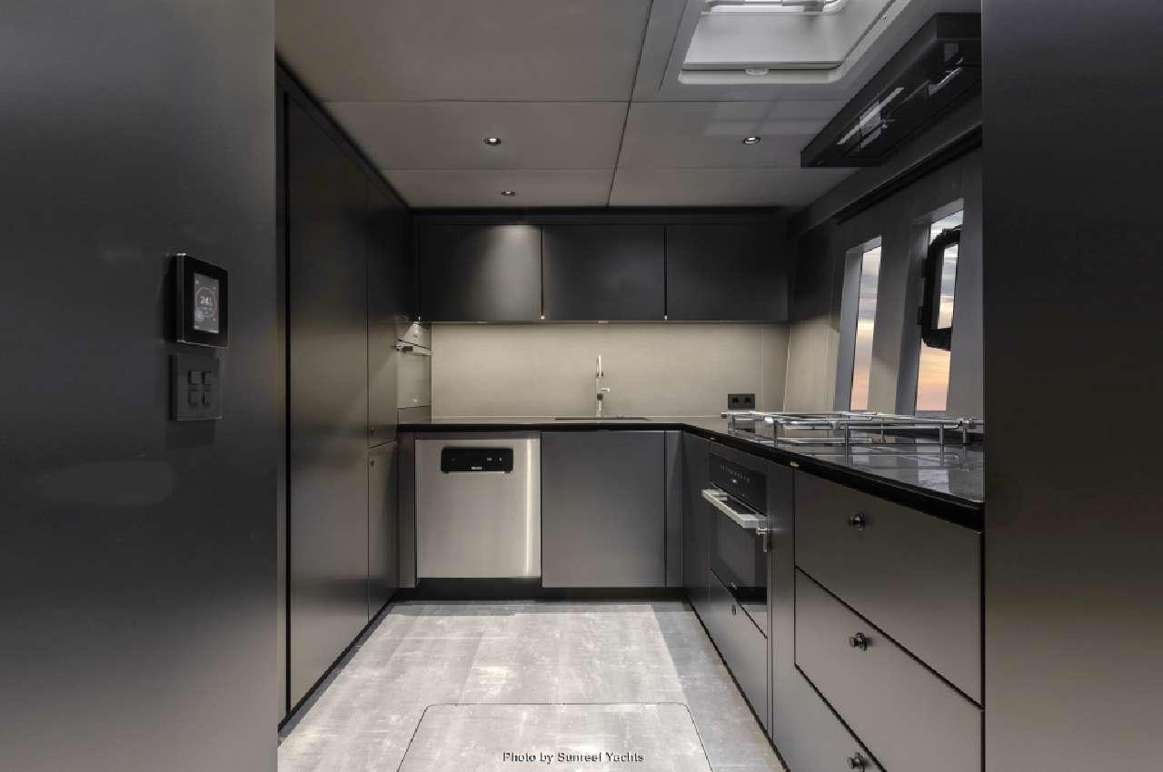 a kitchen with stainless steel appliances aboard SHADES OF GREY Yacht for Charter