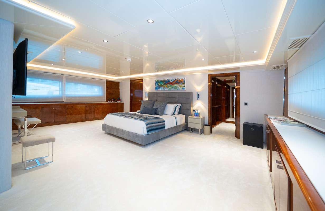 a room with a couch and a table aboard MOKA Yacht for Charter
