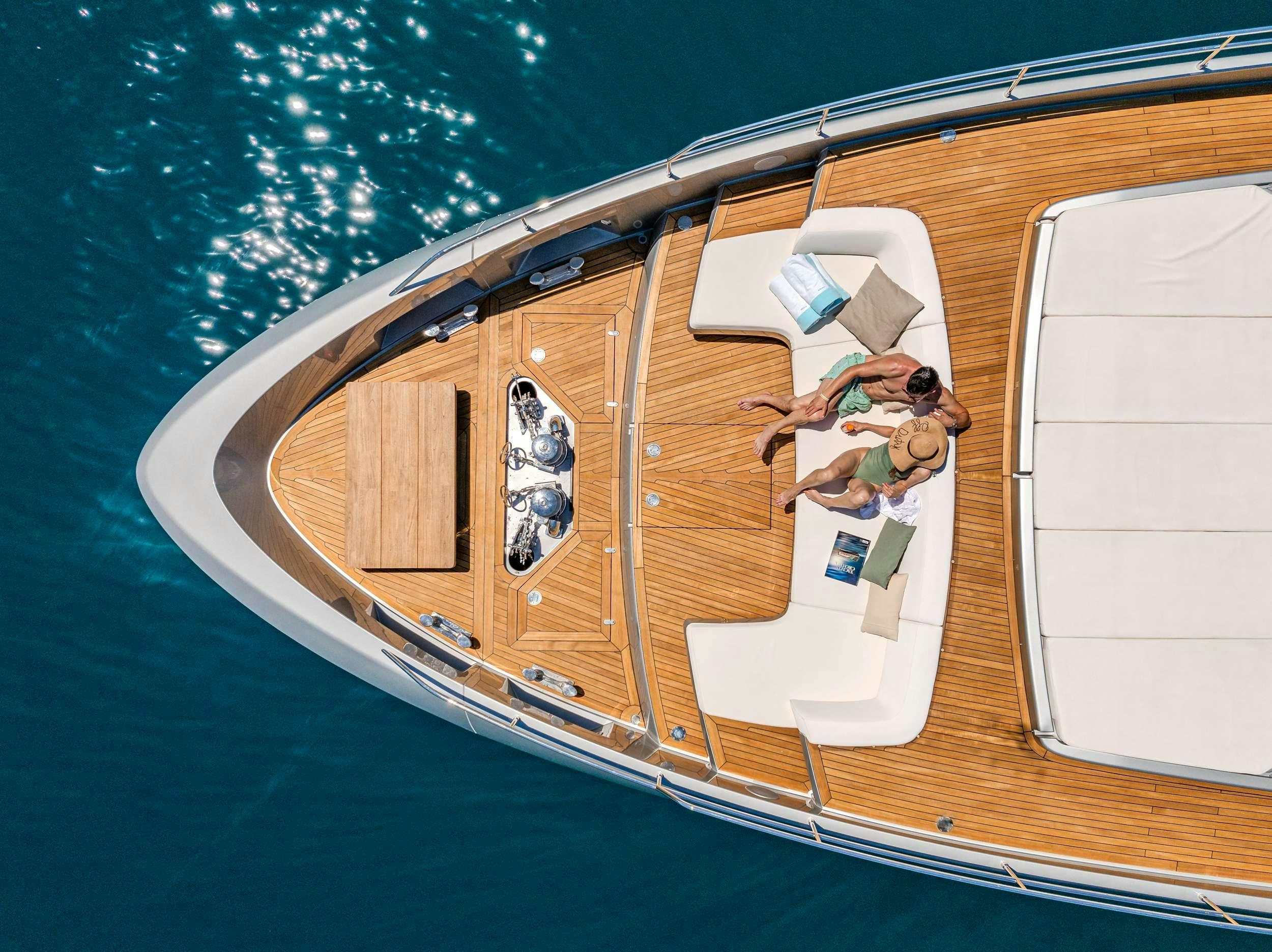 a man and woman in a boat aboard NO STRESS 888 Yacht for Charter