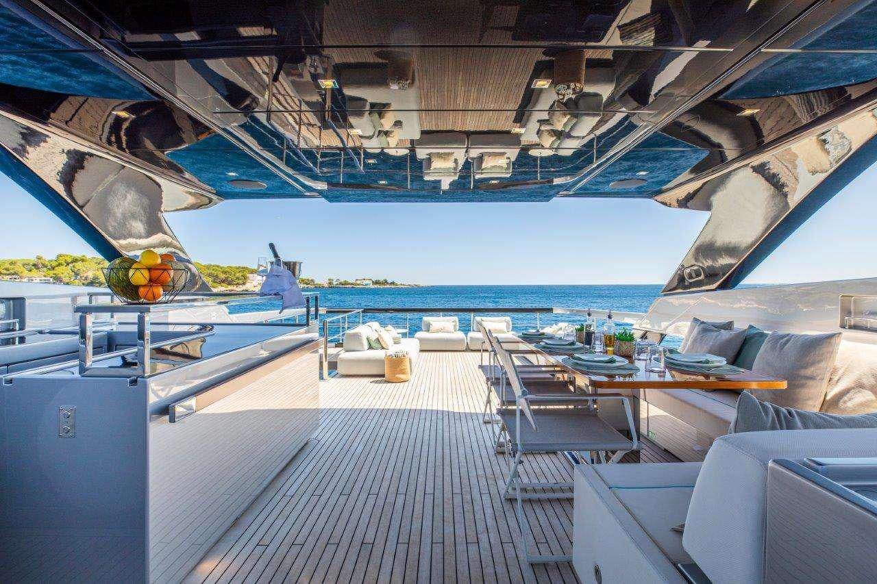 a boat dock with chairs and tables aboard NO STRESS 888 Yacht for Charter