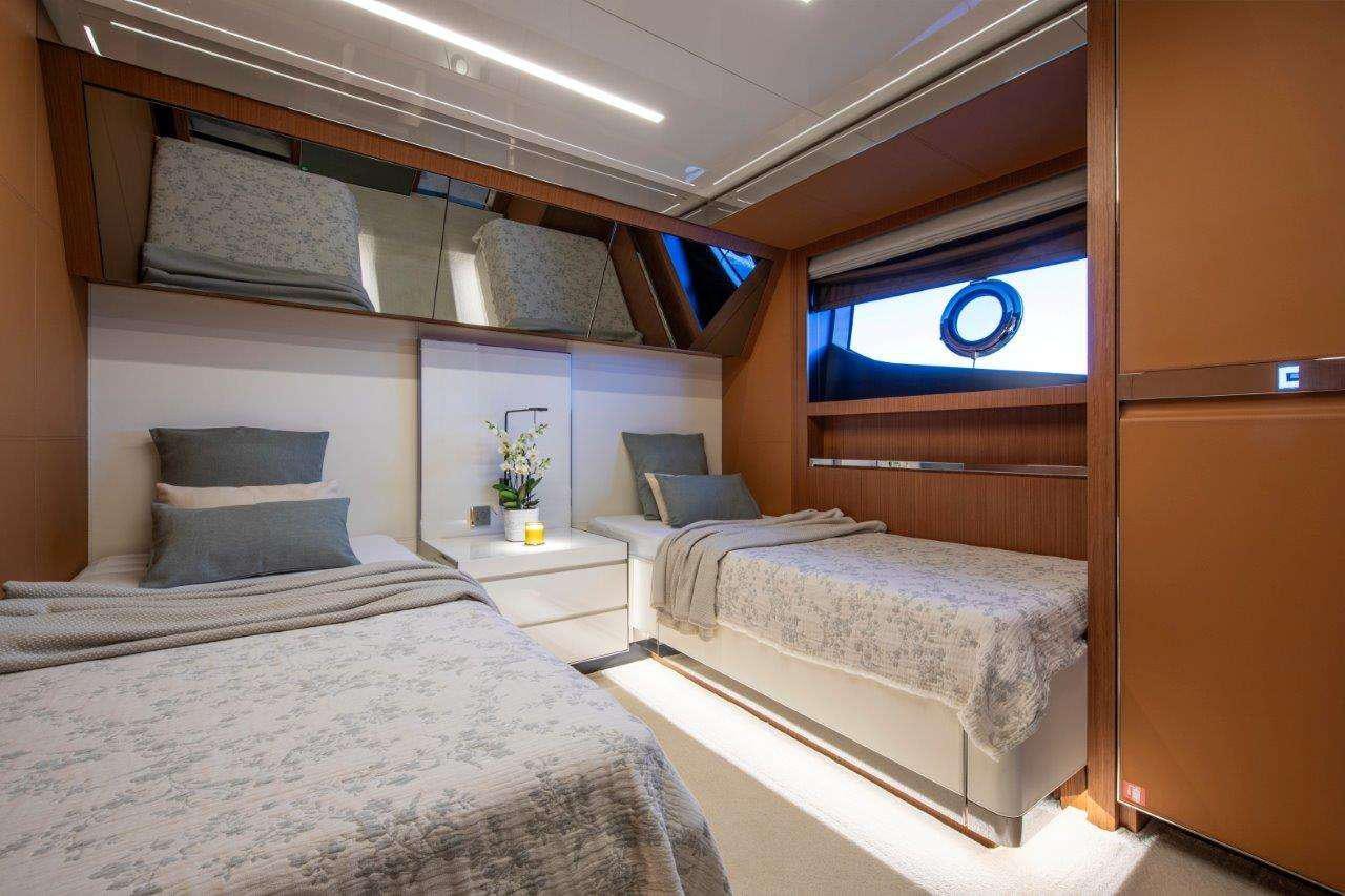 a room with two beds aboard NO STRESS 888 Yacht for Charter