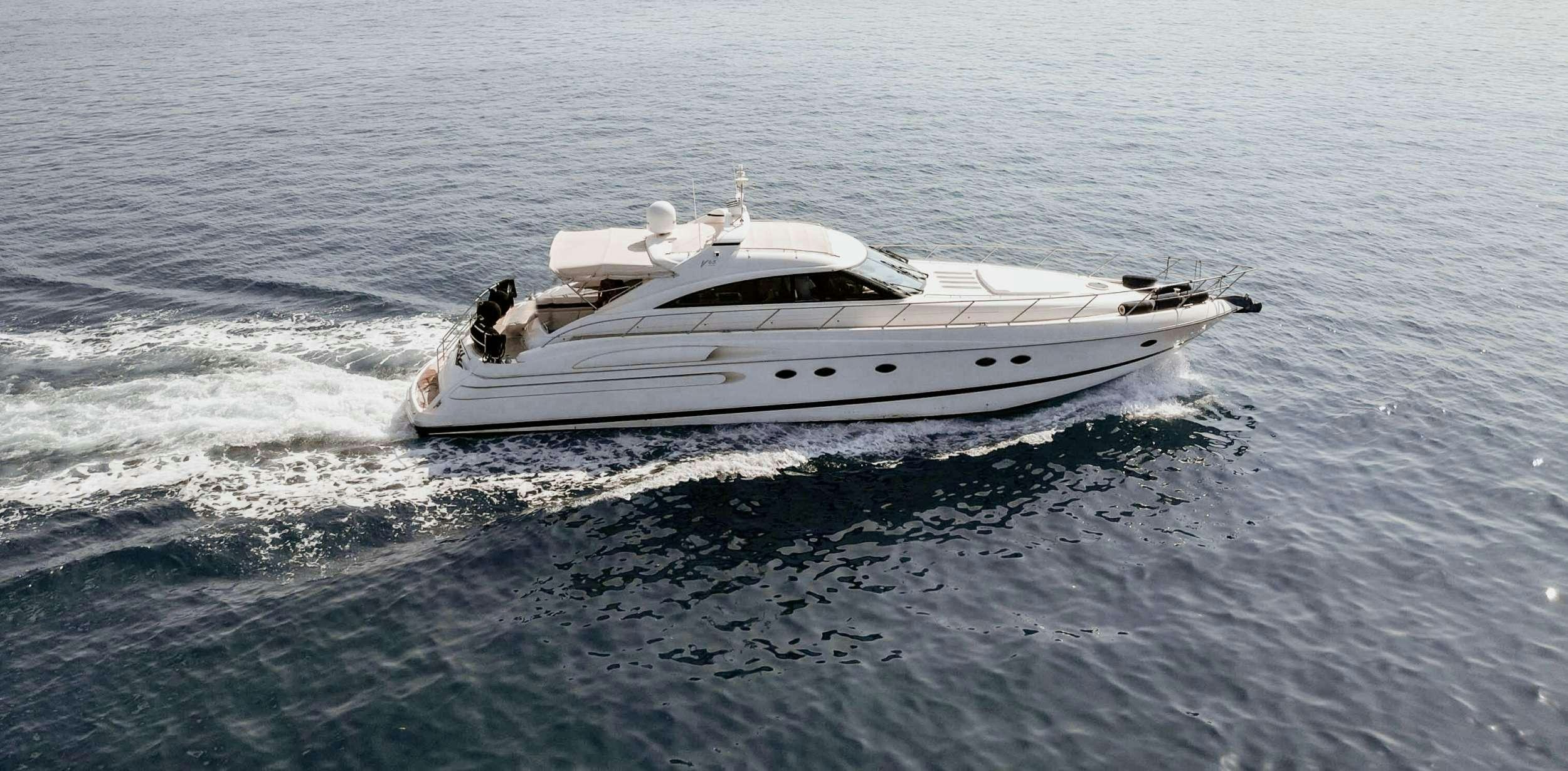 a white yacht in the ocean aboard EVENIA Yacht for Charter