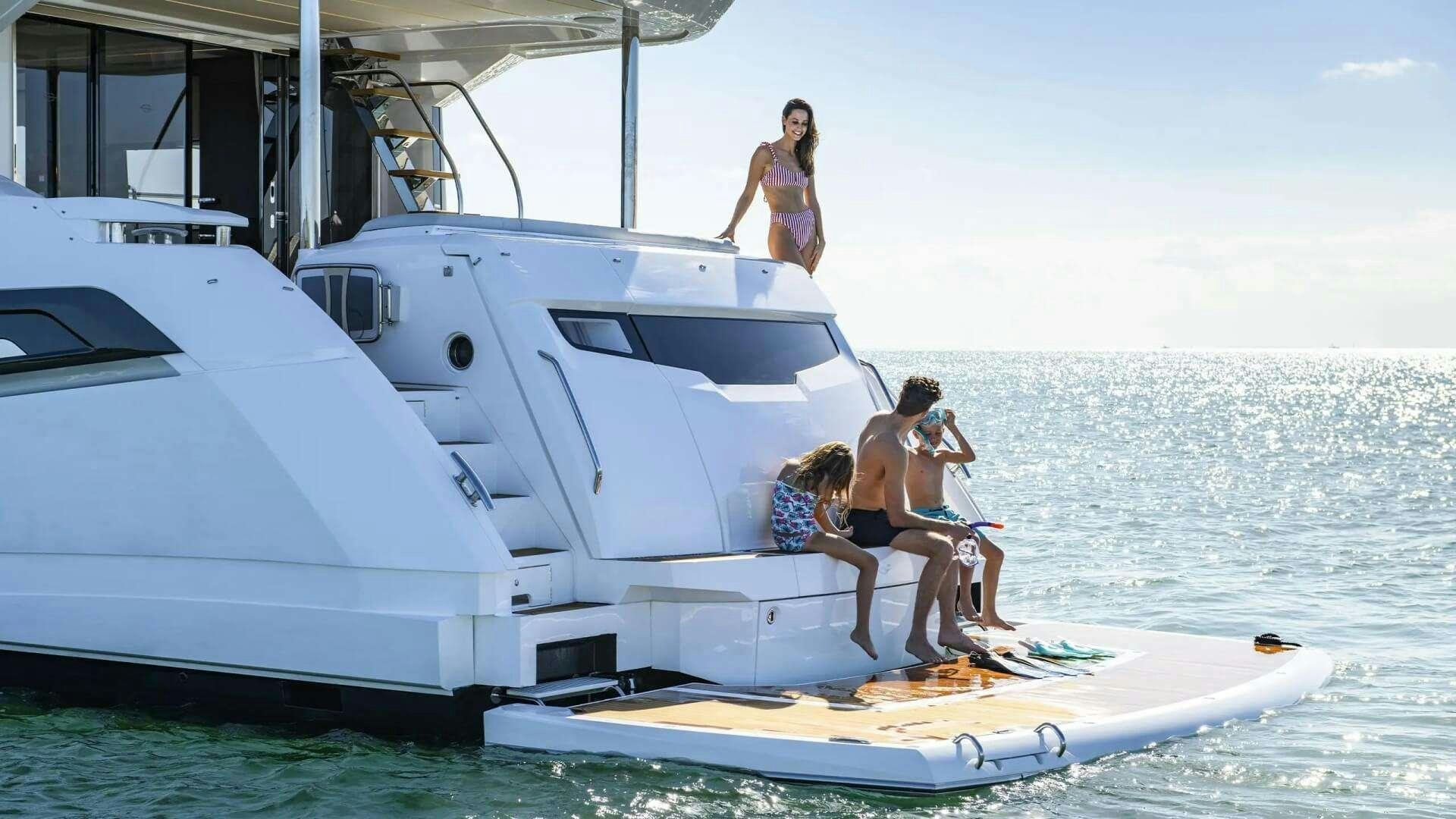 a group of people sitting on a boat aboard APOLLO Yacht for Charter