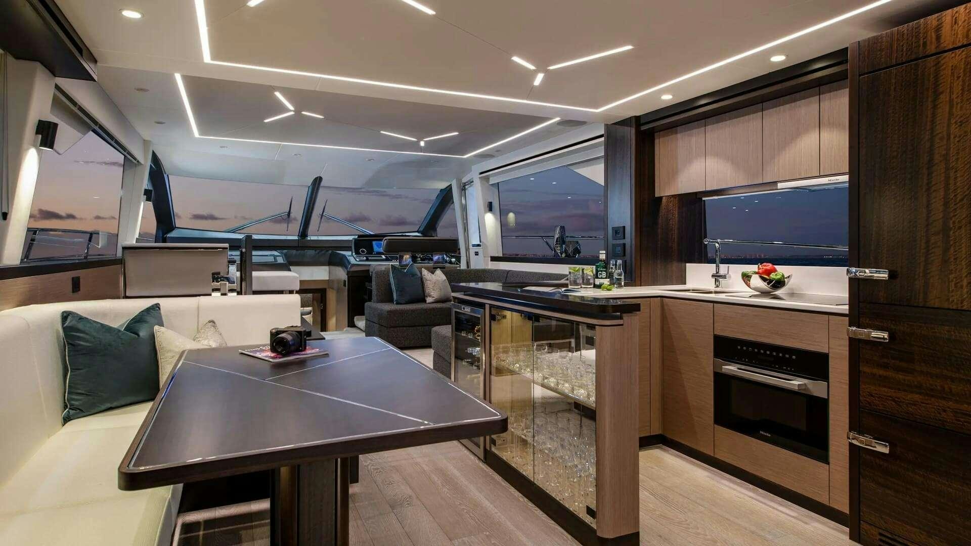 a kitchen and living room aboard APOLLO Yacht for Charter