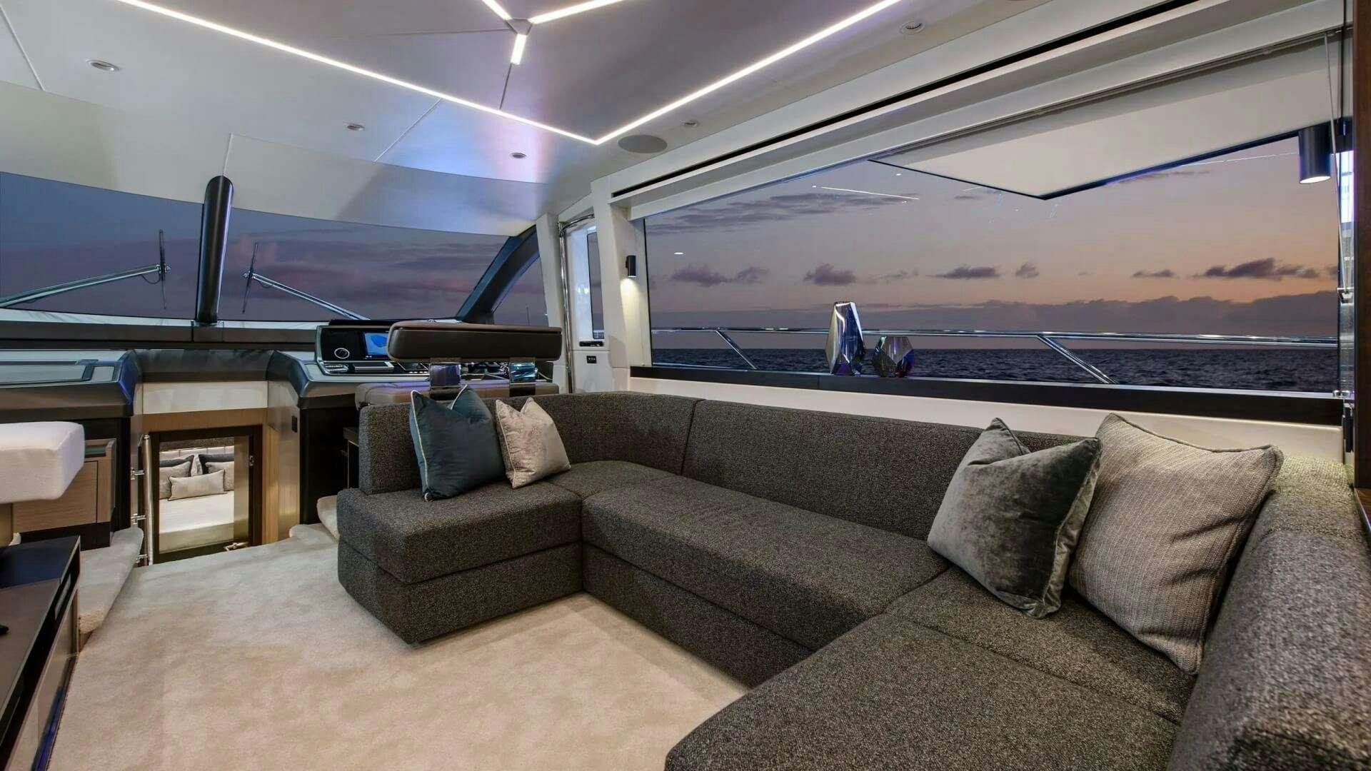 a couch in a room aboard APOLLO Yacht for Charter