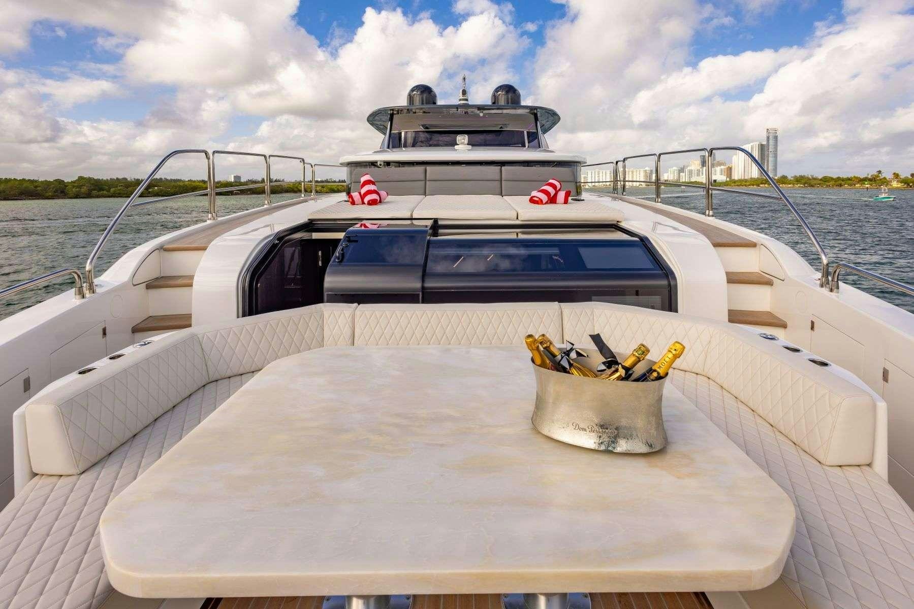 a boat with a yellow object on it aboard OLYMPUS Yacht for Charter