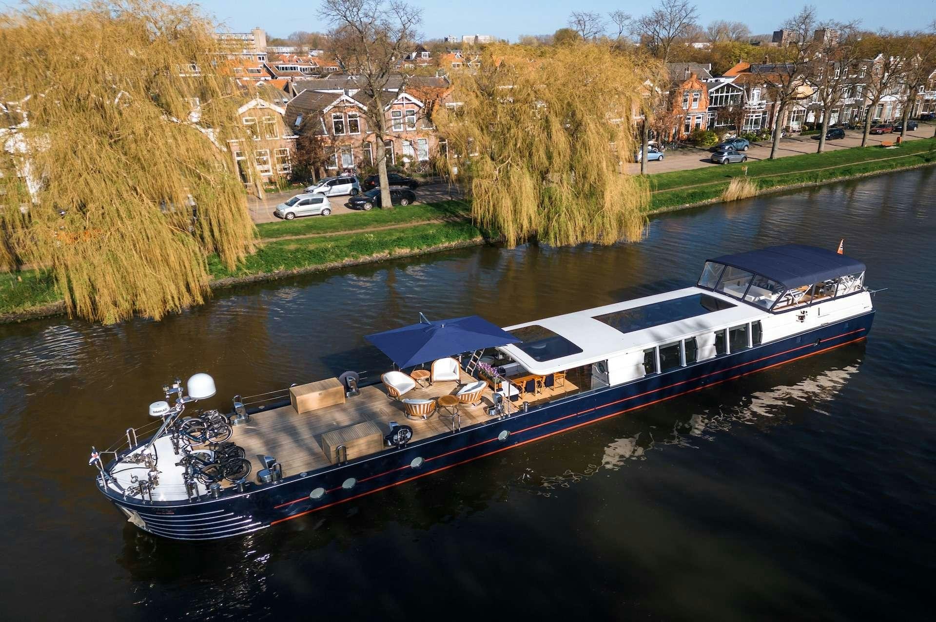 a boat on a river aboard WONDERLAND Yacht for Charter