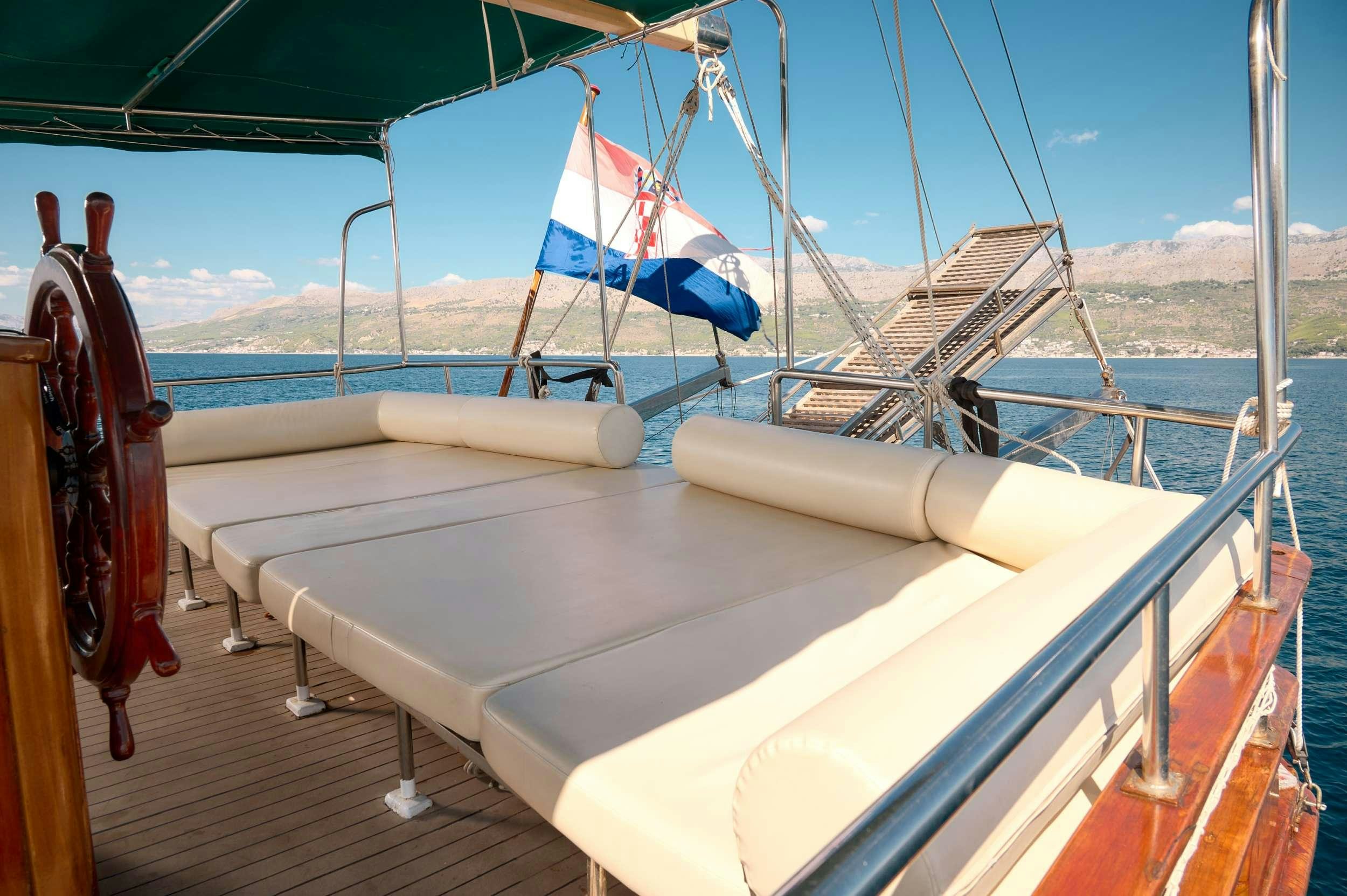 a boat on the water aboard AGORA Yacht for Charter