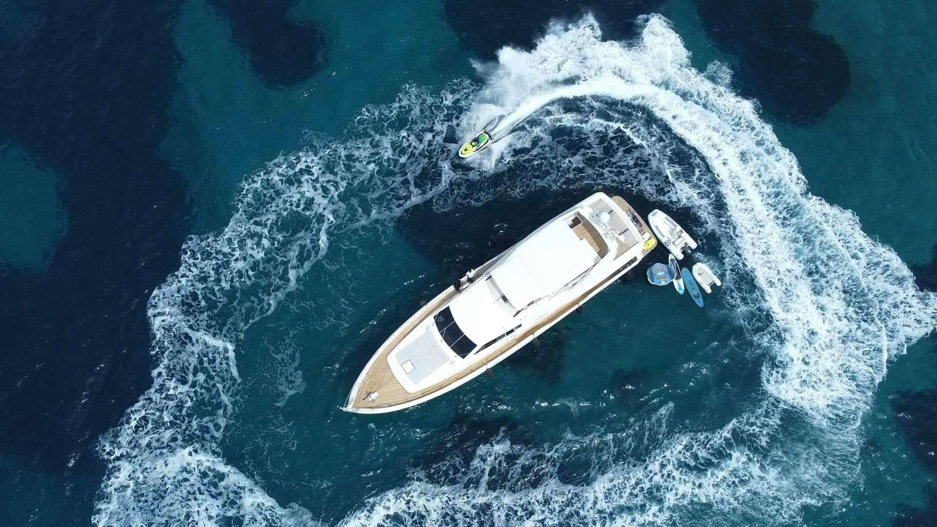 a satellite in space above earth aboard VA BENE Yacht for Charter