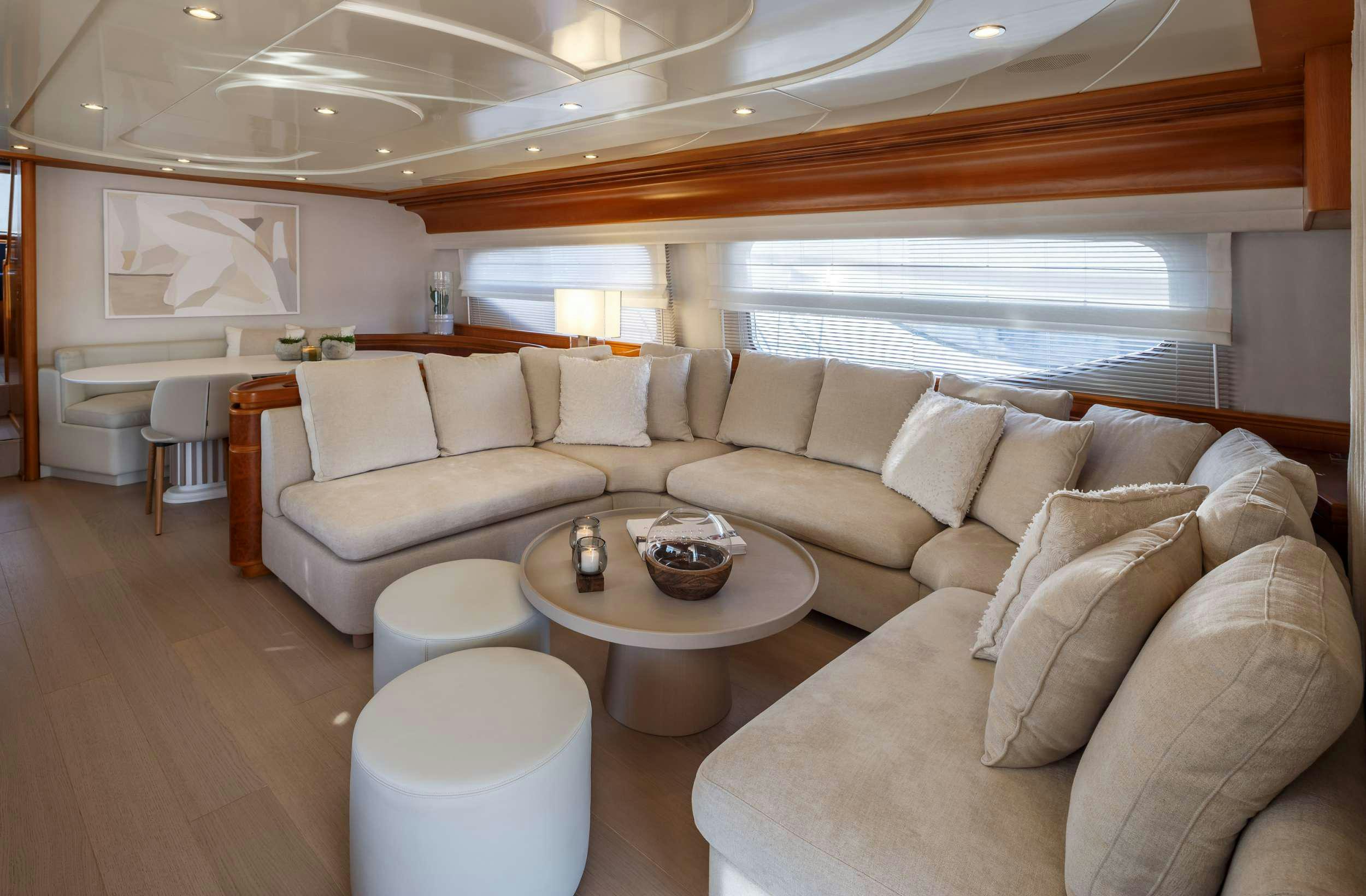a living room with a couch and a table aboard VA BENE Yacht for Charter