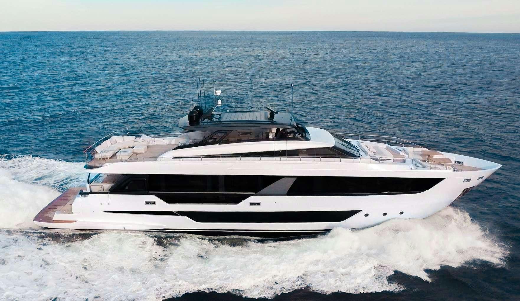 a white yacht on the water aboard KARMA Yacht for Charter