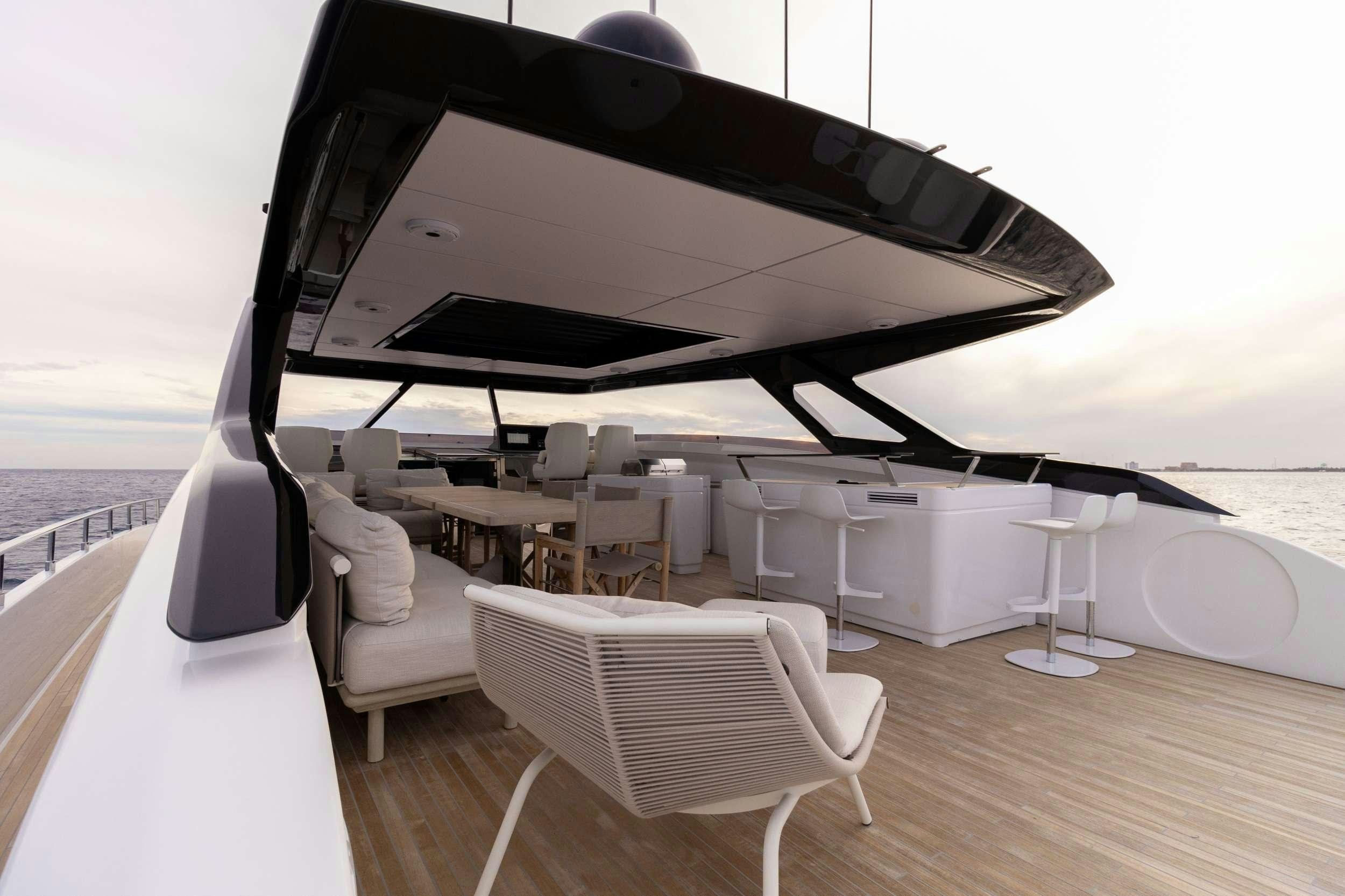 a boat on a deck aboard KARMA  Yacht for Charter
