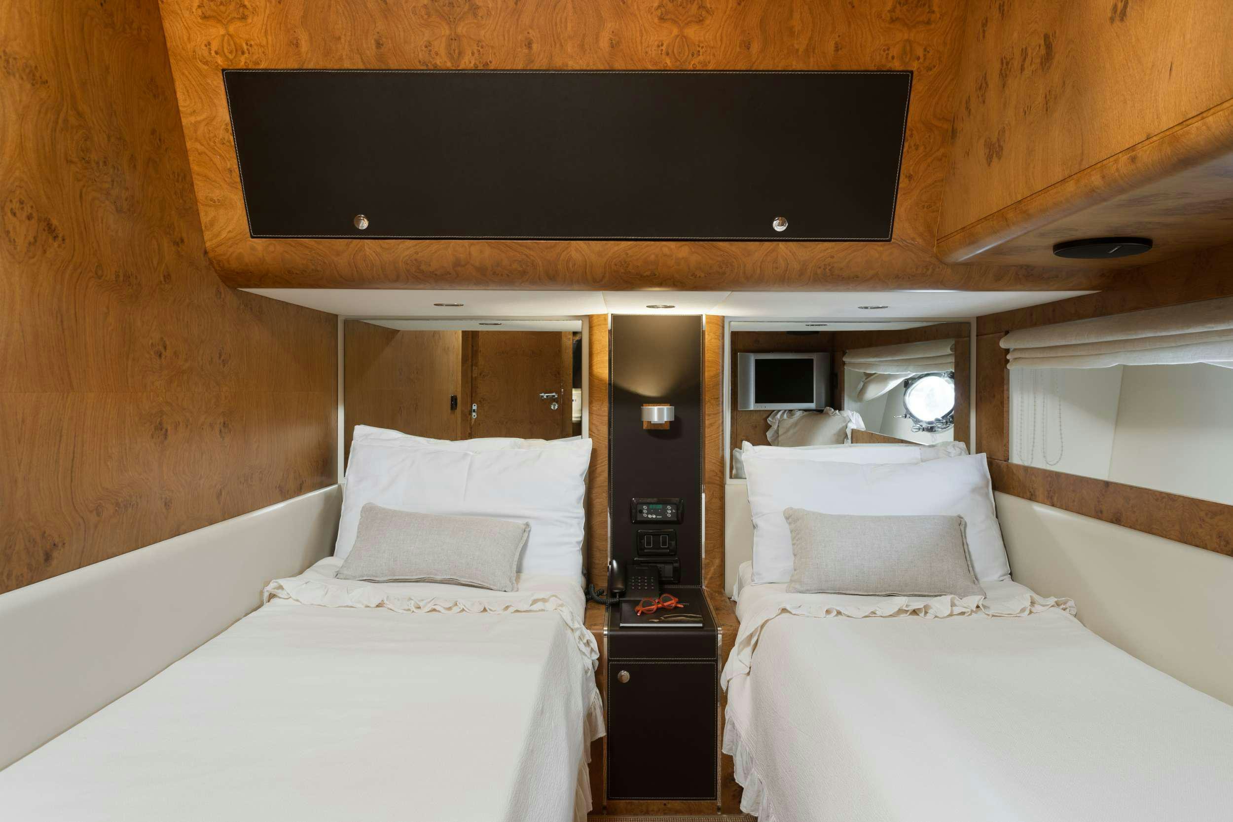 a couple of beds in a cabin aboard ANLIA Yacht for Charter