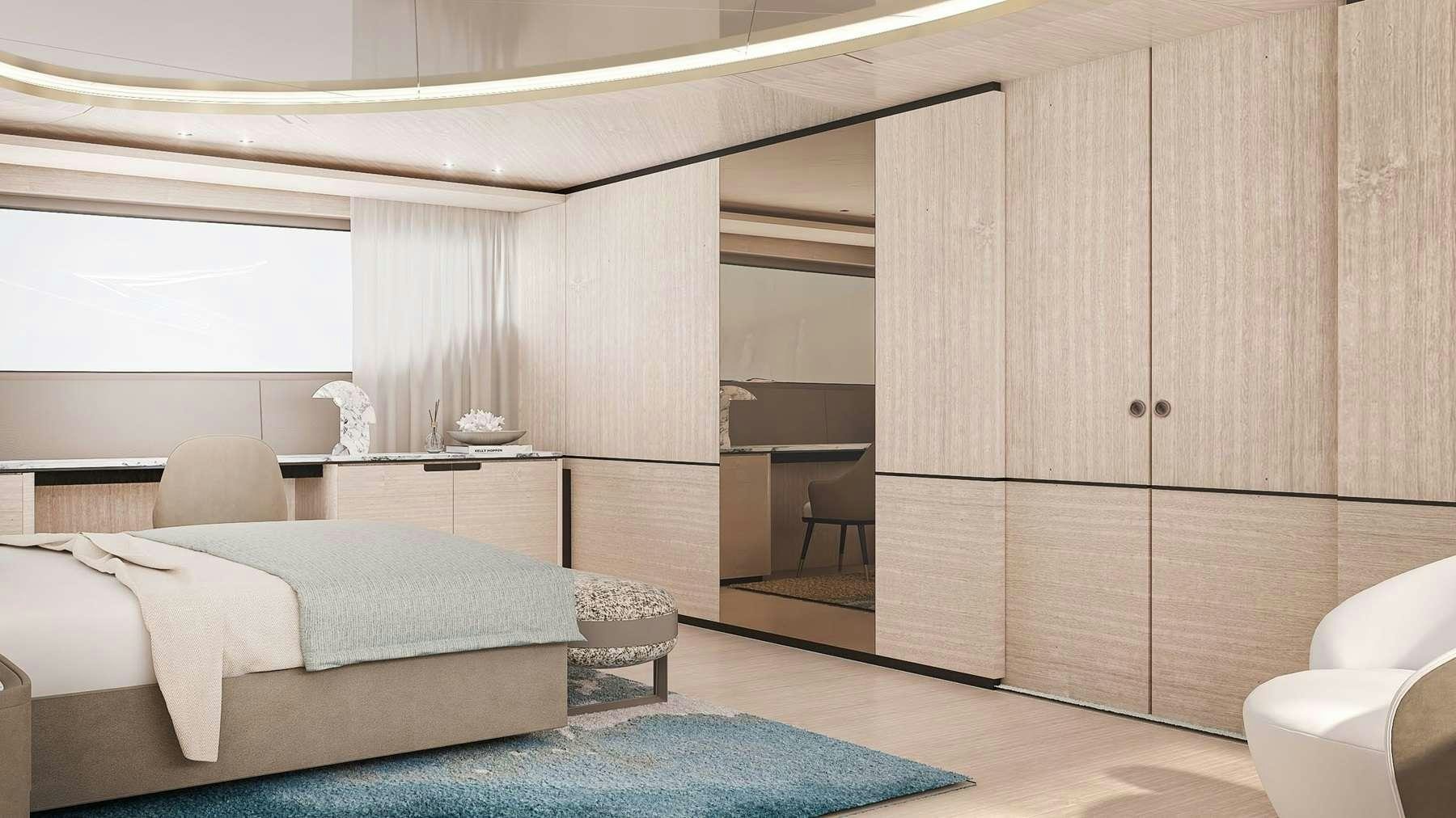 a room with a bed and a couch aboard UNIQUE S Yacht for Charter