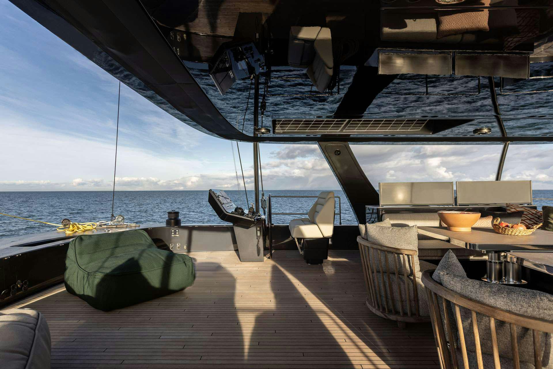 a boat on a deck aboard OTOCTONE Yacht for Charter