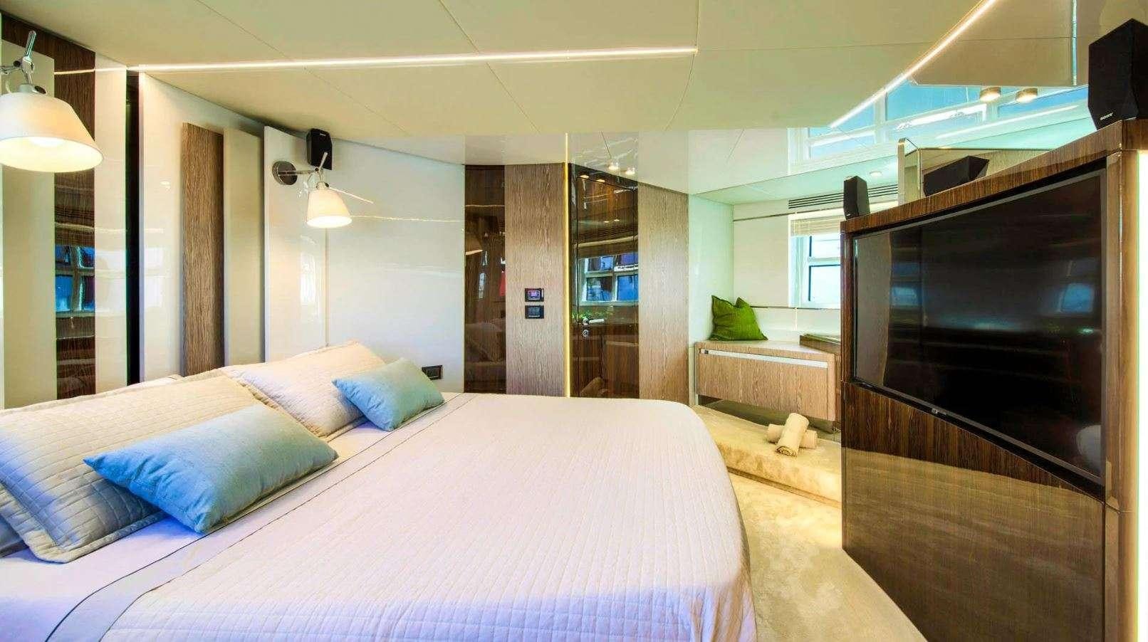 a bed in a room aboard AZIMUT S7 - MUDITA Yacht for Charter