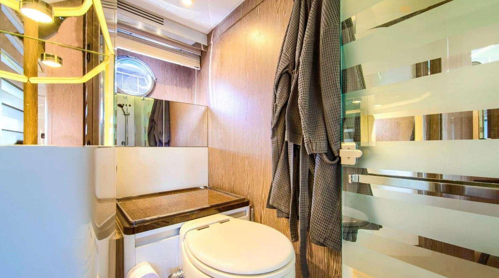 a bathroom with a towel on the wall aboard AZIMUT S7 - MUDITA Yacht for Charter