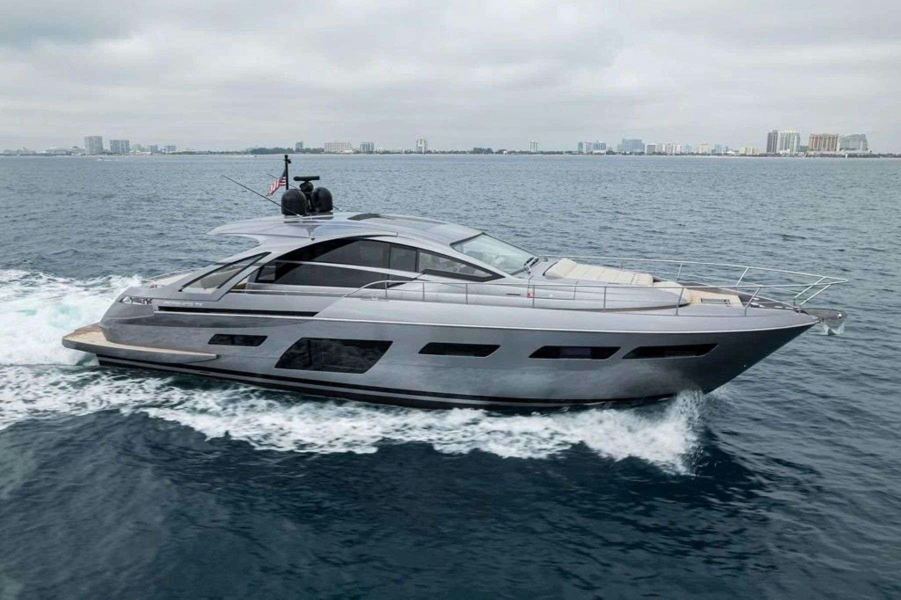 a white yacht on the water aboard AMICI Yacht for Charter