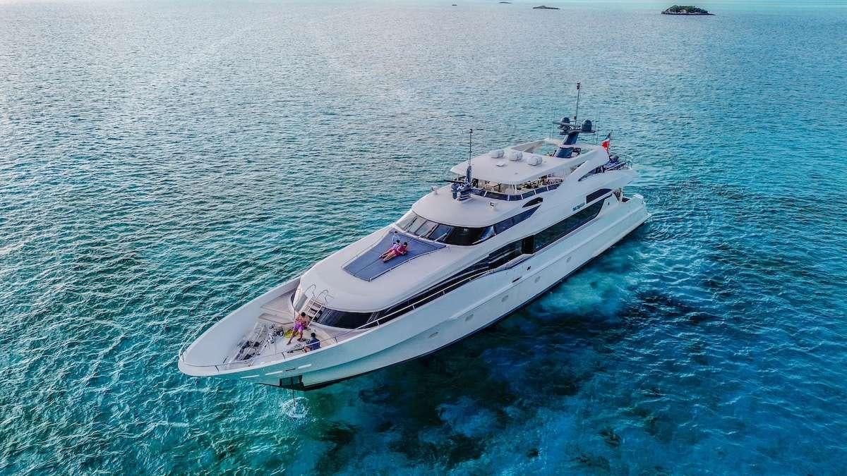 a white boat in the water aboard BLACKSHEEP Yacht for Charter