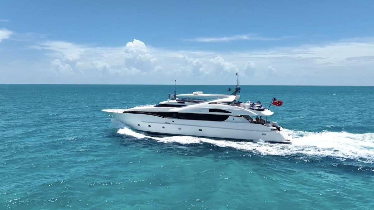 a white boat in the water aboard BLACKSHEEP Yacht for Charter