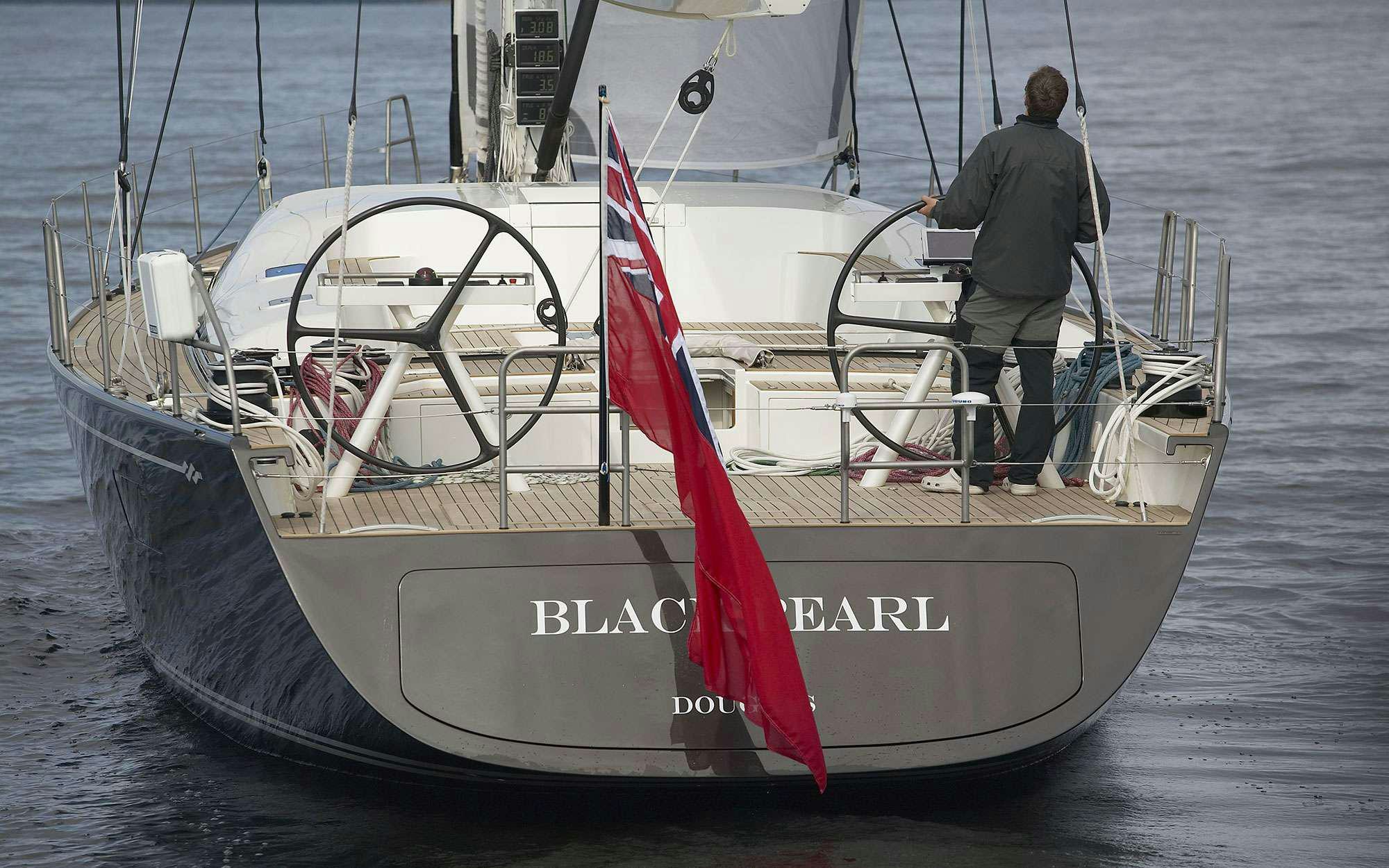 a person standing on a boat aboard BLACK PEARL II Yacht for Charter