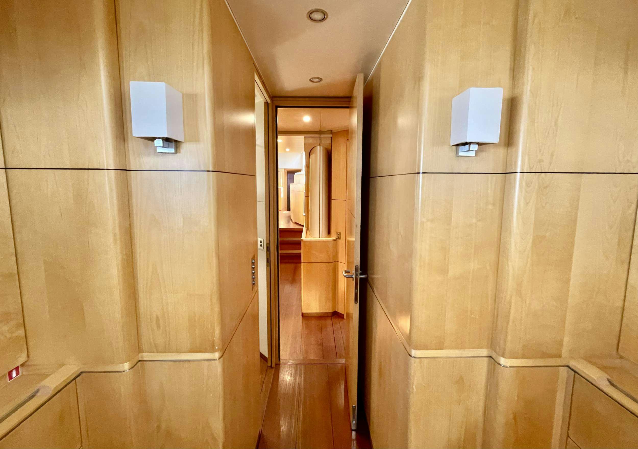 a bathroom with a mirror aboard BLACK PEARL II Yacht for Charter