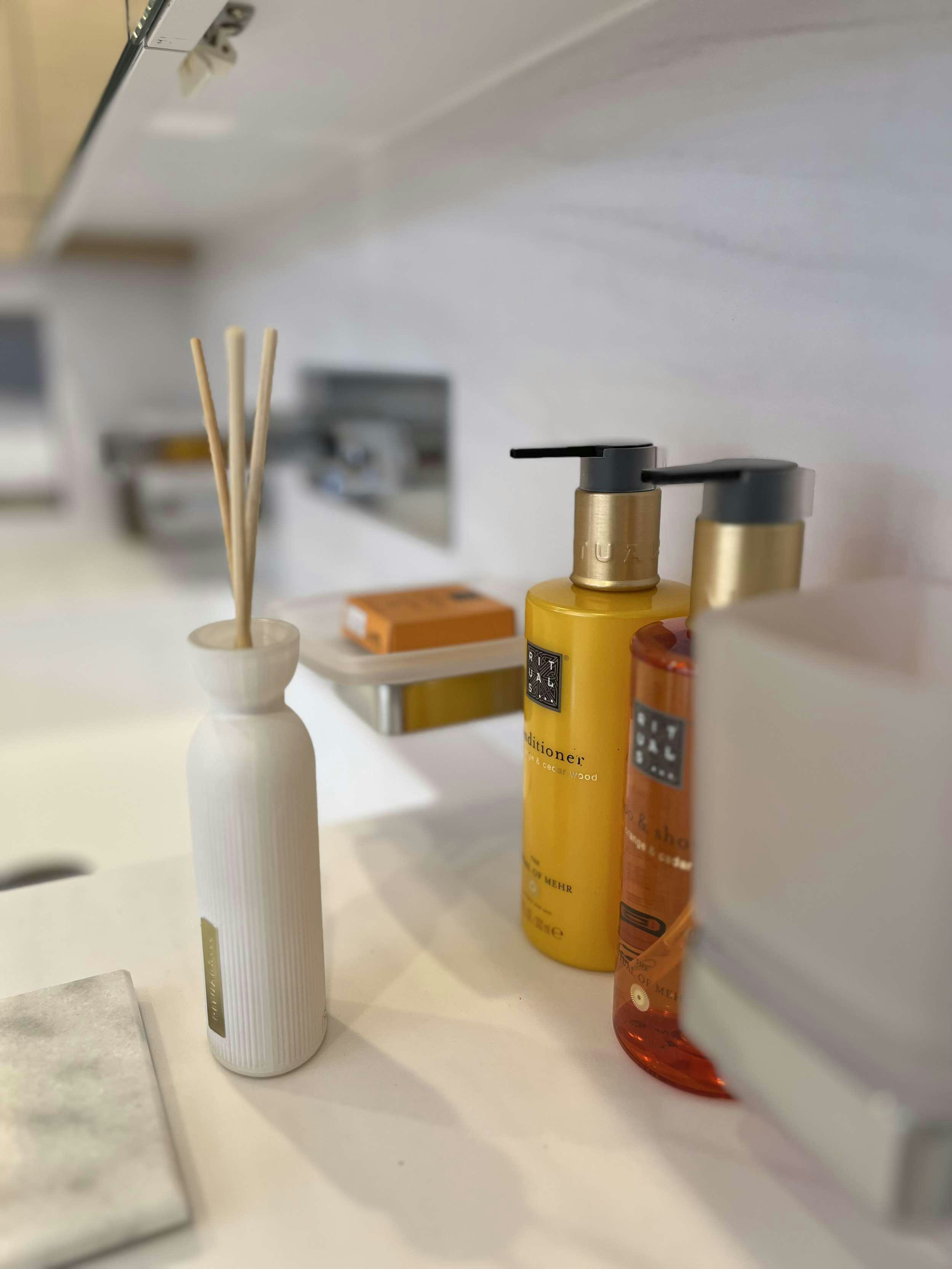 a group of bottles on a table aboard THE BLUE DREAM Yacht for Charter
